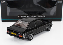 Modèle réduit de voiture Ford Escort Mexico noir à l'échelle 1:18, disponible chez Vroomi pour les collectionneurs.