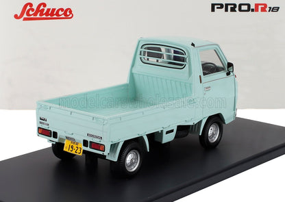 Modèle réduit de mini-camion Honda bleu clair sur socle noir avec logos Schuco PRO.R18, disponible sur Vroomi.
