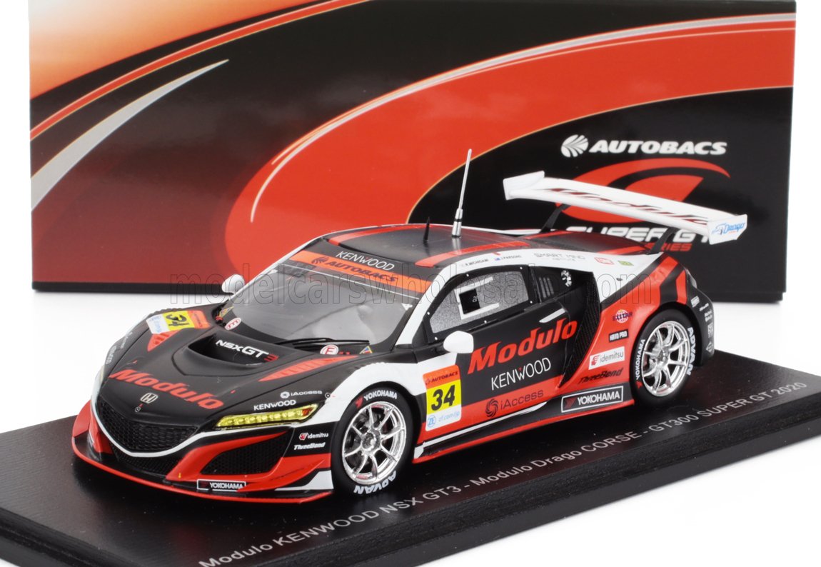 Maquette de la voiture de course Modulo KENWOOD NSX GT3 en noir et rouge, avec les logos des sponsors, présentée dans un coffret de présentation griffé ; désormais disponible sur Vroomi.
