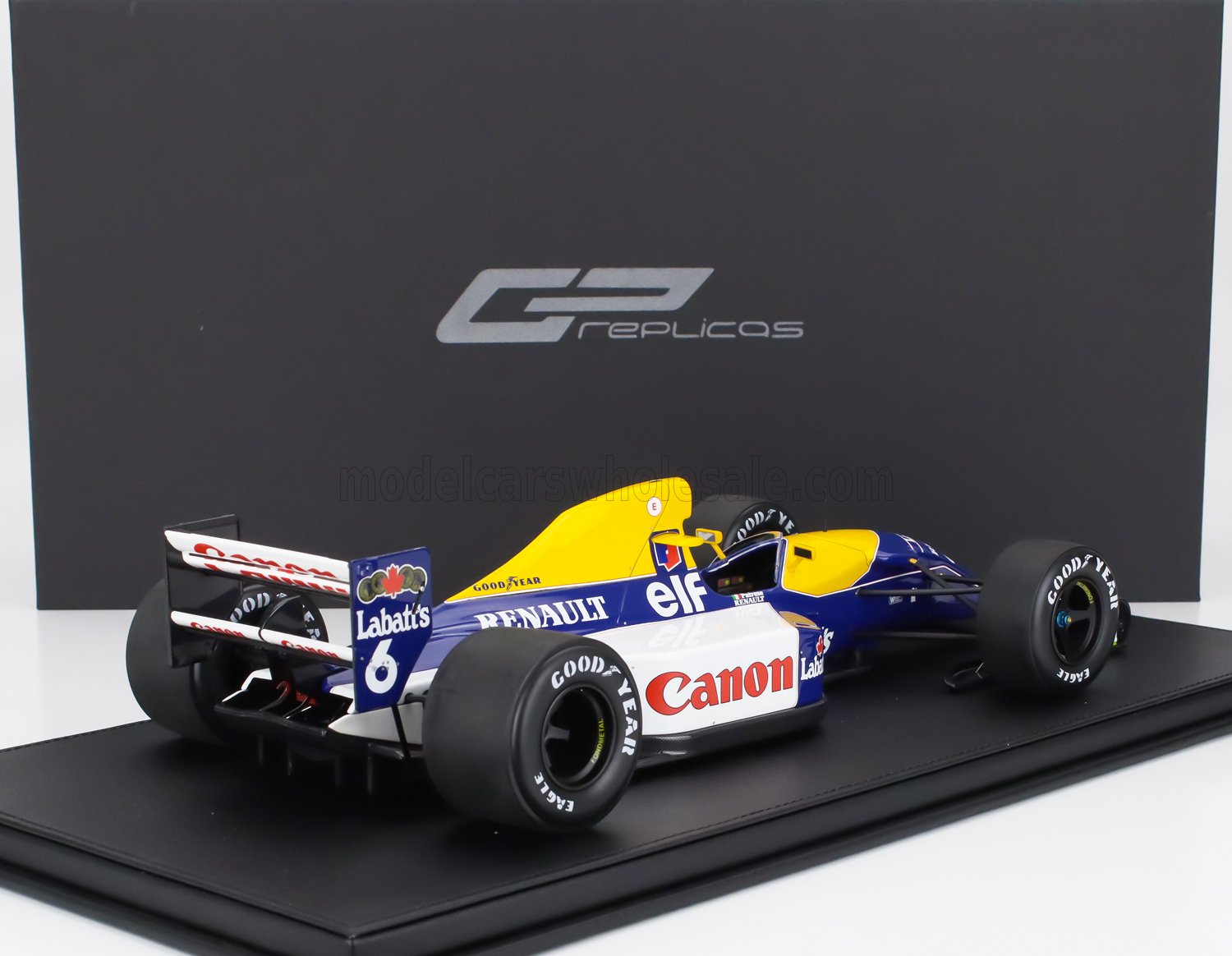 Modèle réduit de voiture de Formule 1 Williams Renault FW14B à l'échelle 1:18 avec les logos Canon et Labatt's, disponible chez Vroomi.