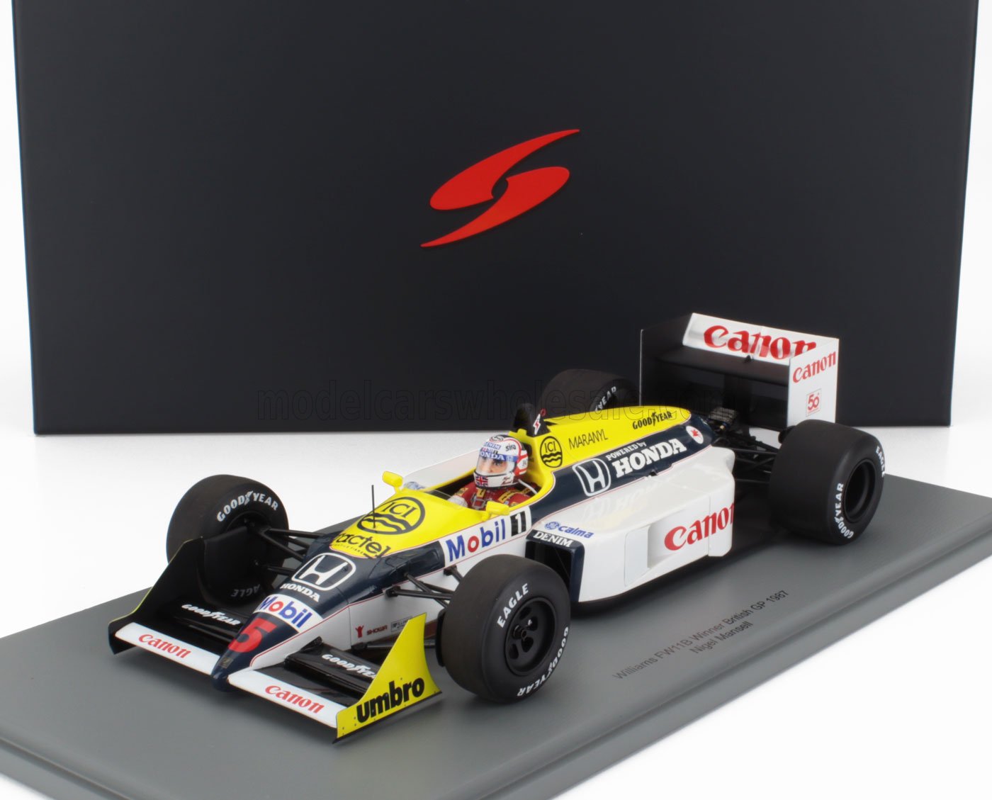 Modèle réduit de voiture de Formule 1 Williams FW11B 1987 avec moteur Honda, marque Canon, présenté sur un socle d'exposition, disponible sur Vroomi.
