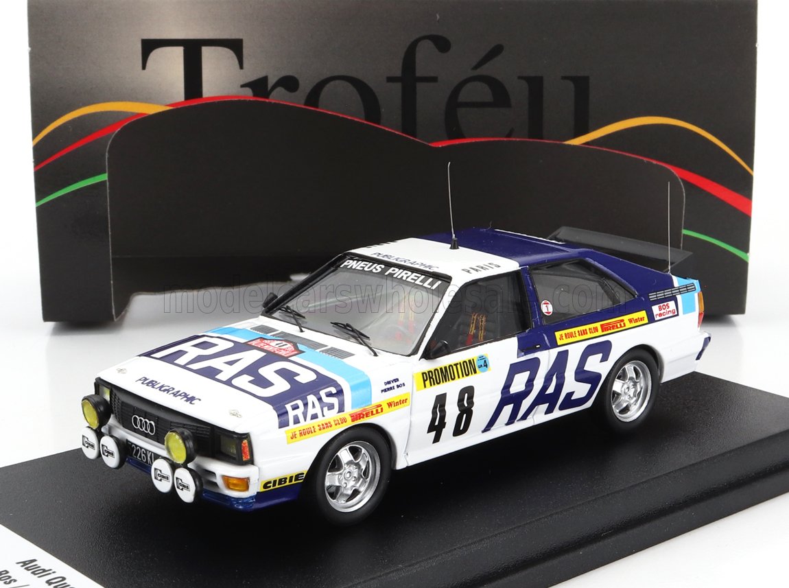 Modèle réduit de voiture de rallye Audi Quattro avec livrée RAS et décalcomanies de course, disponible sur Vroomi.