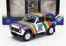 LADA - NIVA N 182 RALLYE PARIS-DAKAR 1984 JEAN PIERRE JABOUILLE - MICHEL SARDOU - BLANC BLEU - Vroomi