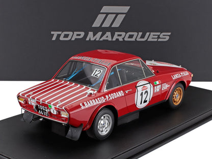 Modèle réduit de voiture de rallye Lancia rouge portant le numéro 12 et des autocollants de course, présenté avec le logo Top Marques, désormais disponible sur Vroomi.