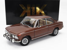 Modèle réduit détaillé de la BMW Diana classique de couleur marron avec des accents chromés, présenté dans une boîte à l'échelle KK, disponible sur Vroomi.