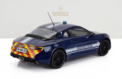 Modèle de voiture de police de la Gendarmerie bleu foncé avec bandes rouges et jaunes en forme de chevron à l'arrière, disponible sur Vroomi.