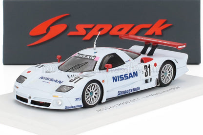 White Nissan R390 GT1 race car model with red accents and Bridgestone logos, available on Vroomi