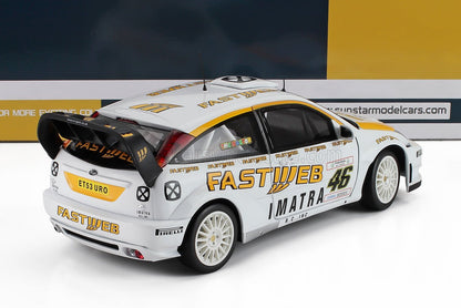 Modèle réduit à l'échelle 1/18 d'une voiture de rallye Ford Focus avec livrée Fastweb, disponible chez Vroomi.