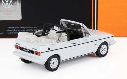 Modèle réduit de Volkswagen Golf GTI cabriolet blanche avec intérieur noir, disponible sur la plateforme Vroomi.