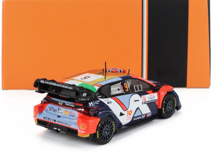Modèle réduit de voiture de rallye Hyundai avec décalcomanies détaillées des sponsors, présenté sur fond orange et noir, également disponible chez Vroomi.