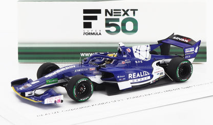 Modèle réduit bleu et blanc de la voiture de course Super Formula du Realize Group, arborant le logo NEXT 50, disponible via Vroomi.