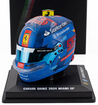 Casque de course bleu Carlos Sainz 2024 Miami GP avec logos Ferrari et sponsors, disponible sur Vroomi