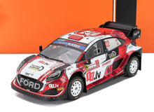 Modèle réduit de voiture de rallye Ford rouge et blanche à l'échelle 1:18, disponible dès maintenant chez Vroomi.