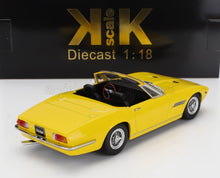 Modèle réduit Maserati Ghibli cabriolet à l'échelle 1:18, couleur jaune, avec intérieur détaillé, disponible sur la plateforme Vroomi.