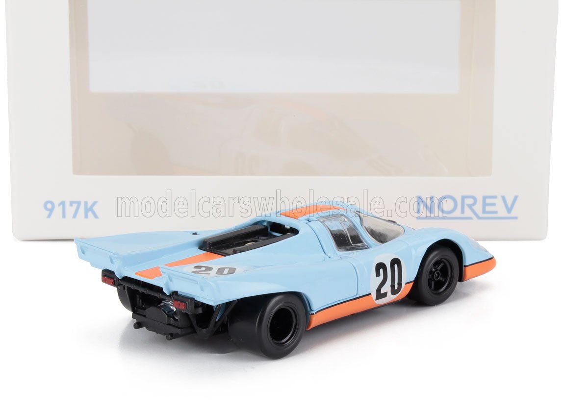 Modèle réduit Porsche 917K bleu et orange avec le numéro 20, disponible sur Vroomi