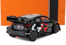 Black Toyota Yaris WRC rally car model with racing decals and spoiler, available on Vroomi