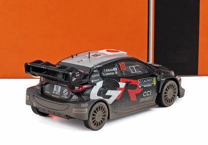 Detailed scale model of black and red Toyota GR rally car with dirt effects, available on Vroomi