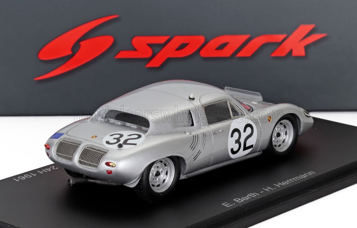 Silver Porsche 24H 1961 race car model number 32 on display platform, offered now on Vroomi