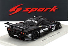 Modèle réduit de voiture de course Loctite noir avec logo BMW et numéro 41 sur socle d'exposition, proposé chez Vroomi.