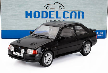 Modèle réduit Ford Escort noir à l'échelle 1:18 en métal moulé sous pression avec boîte, disponible chez Vroomi