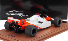 Tecnmodel Mythos 1:43 scale race car model in orange and white on display, offered on Vroomi