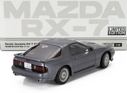 Modèle réduit Mazda RX-7 FC3S à l'échelle 1/18, couleur grise, objet de collection disponible sur Vroomi