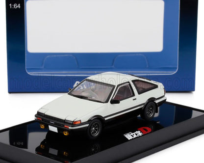 Modèle réduit Toyota AE86 Trueno blanc sur socle noir avec emballage bleu, disponible sur Vroomi