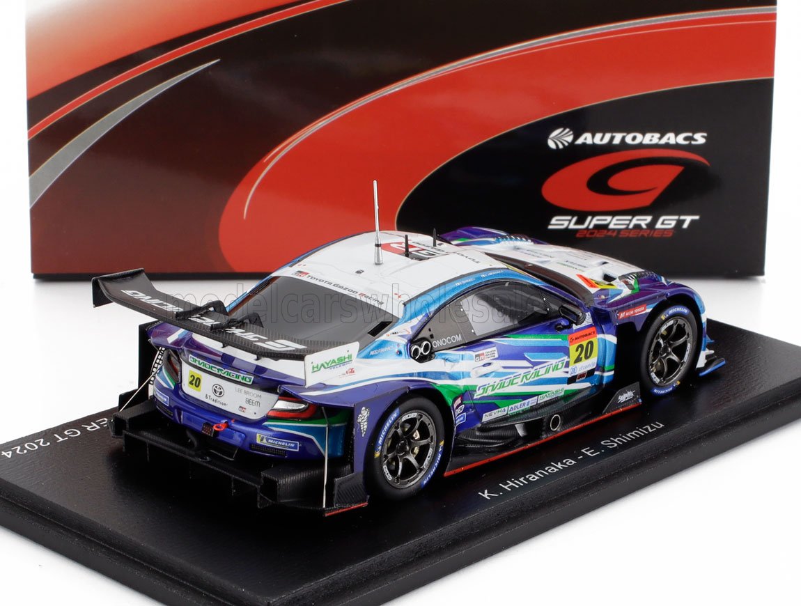Modèle réduit détaillé de la voiture de course Toyota Gazoo Racing Super GT avec livrée bleue et blanche sur socle d'exposition disponible sur Vroomi