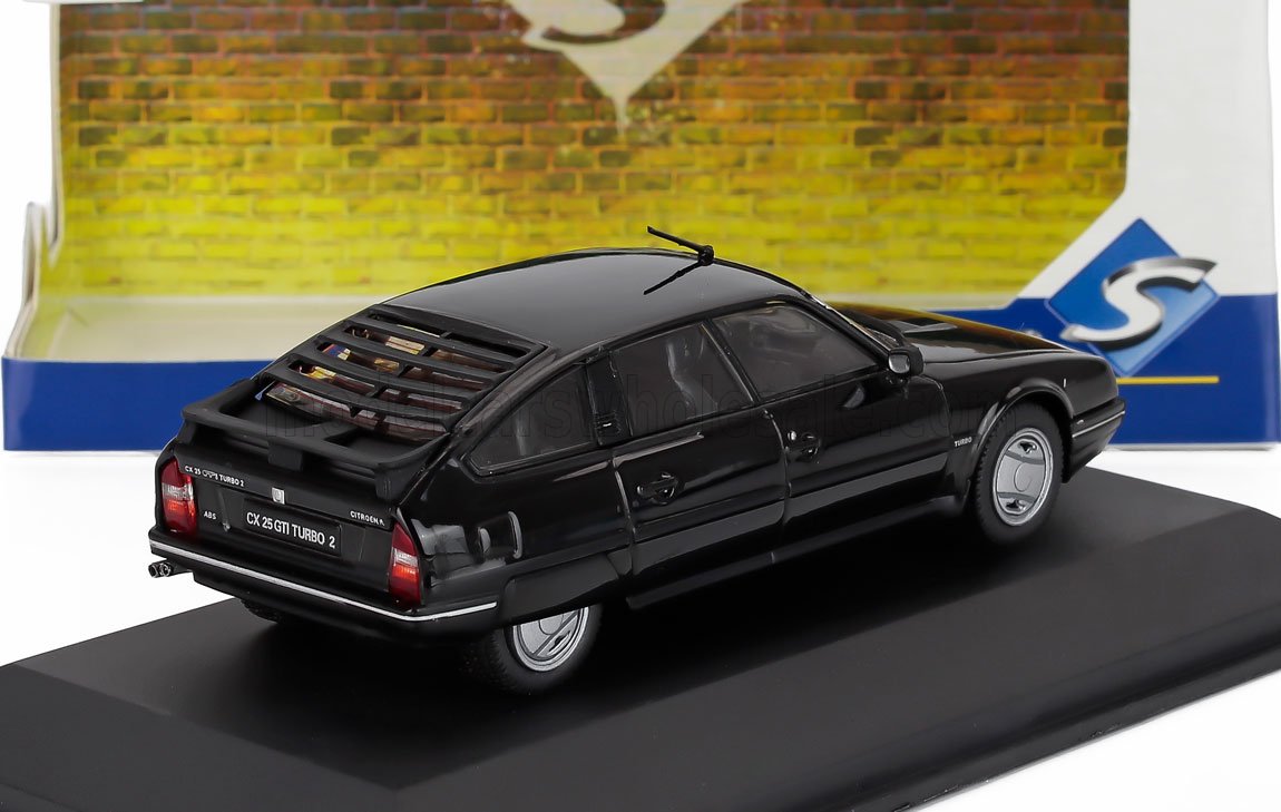 Modèle réduit Citroën CX 25 GTI Turbo 2 noir sur présentoir avec fond de marque, disponible sur Vroomi
