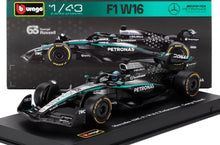MERCEDES GP -  F1  W16 TEAM AMG PETRONAS MOTORSPORT N 63 SAISON 2025 GEORGE RUSSELL - AVEC PILOTE ET PRÉSENTOIR - NOIR ARGENT VERT