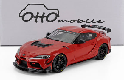 Modèle réduit de voiture de course Toyota GR Supra rouge avec spoiler noir et pneus Pirelli, proposé sur Vroomi.