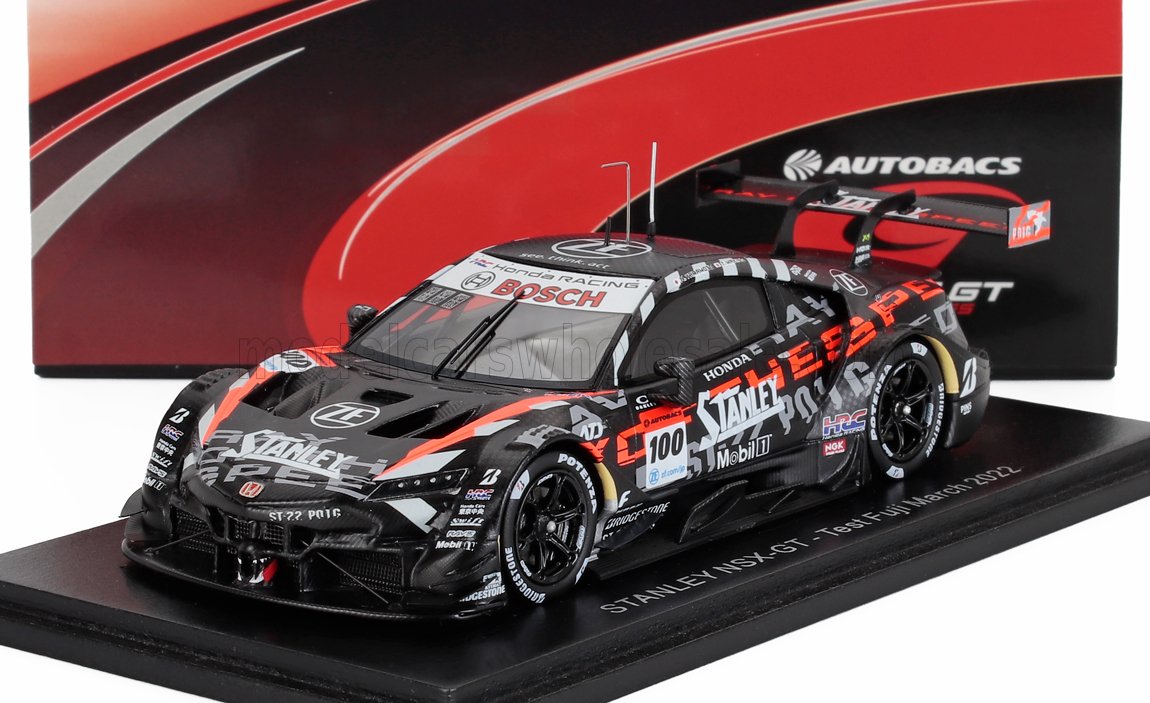 Modèle réduit de voiture de course Honda Stanley NSX-GT avec livrée noire et rouge exposé, désormais disponible sur Vroomi.