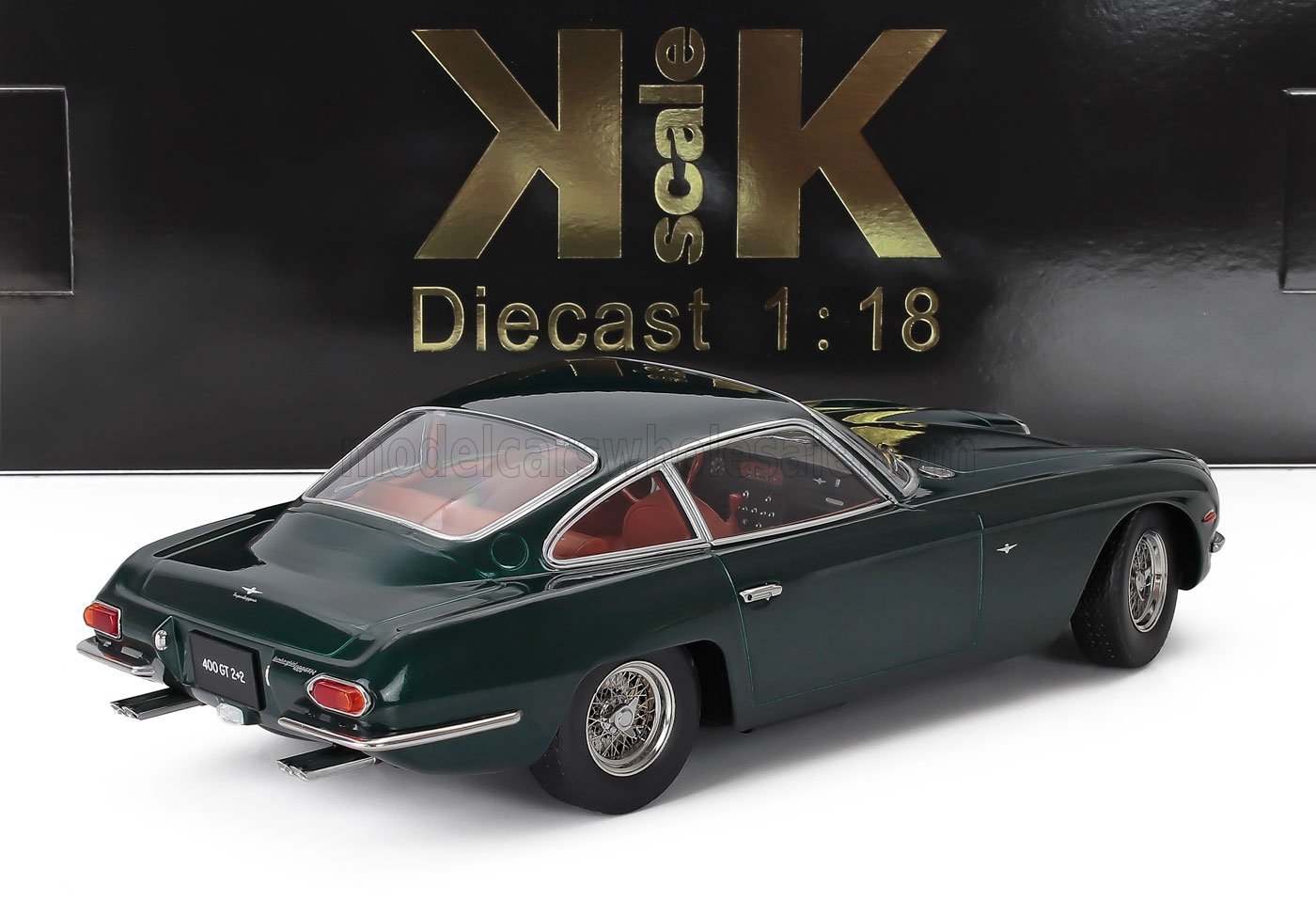 Modèle réduit Green à l'échelle 1:18 de la Lancia Flaminia 400 GT 2+2 avec intérieur rouge, disponible chez Vroomi.