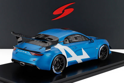 Blue Alpine race car model with large rear wing and white racing decals, featured on Vroomi