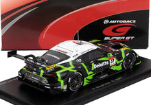 Modèle réduit à l'échelle 1/43 de la Toyota GR Supra Super GT avec livrée Deloitte en noir, vert et blanc sur socle d'exposition, disponible chez Vroomi.