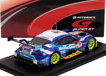Modèle réduit détaillé à l'échelle 1/43 d'une voiture de course WebsSport bleue et blanche sur socle noir, avec roues vert vif et décor Super GT, disponible chez Vroomi.