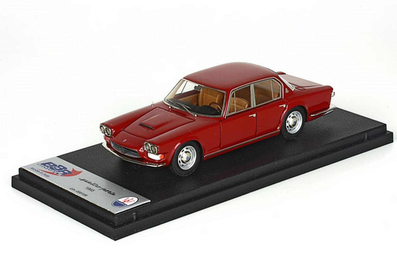 Red 1965 Maserati Quattroporte model car on black display base, available via Vroomi platform