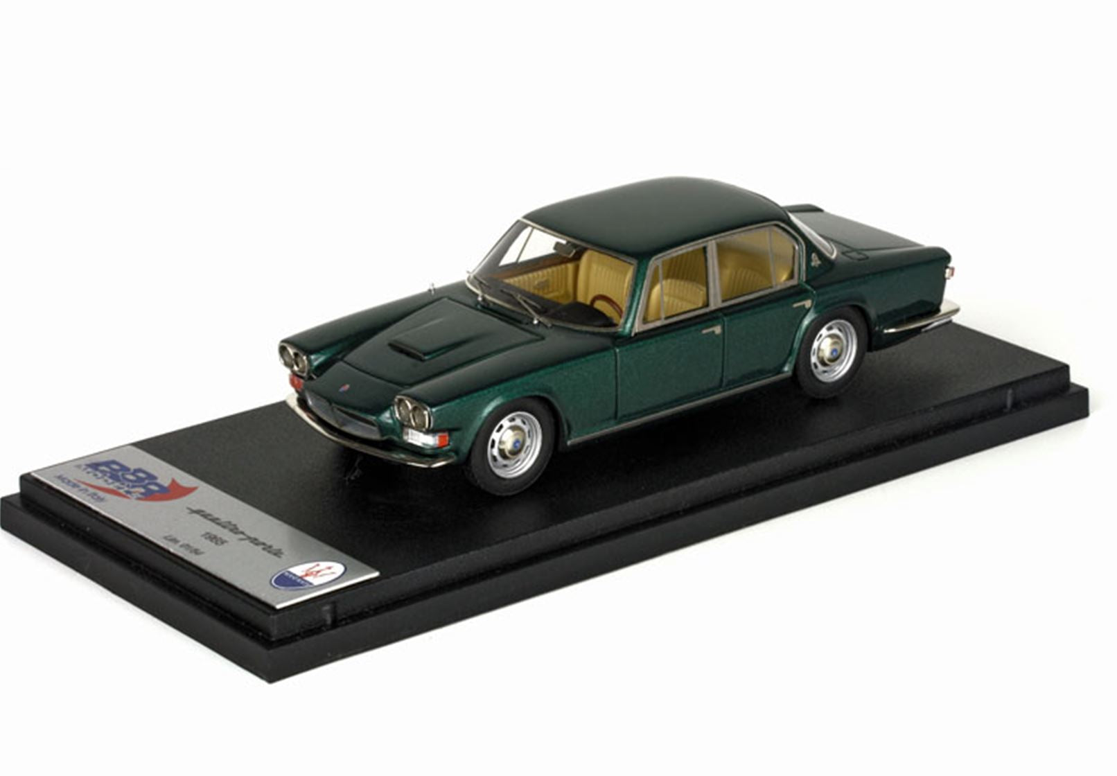 Green 1965 Maserati Quattroporte scale model with beige interior displayed on black stand, offered on Vroomi