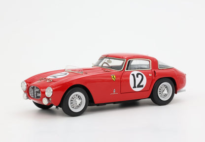 Red vintage Ferrari race car model with number 12, detailed wheels, and Pininfarina emblem, purchasable on Vroomi