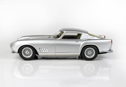 Silver classic vintage sports car side view on white background, available via Vroomi