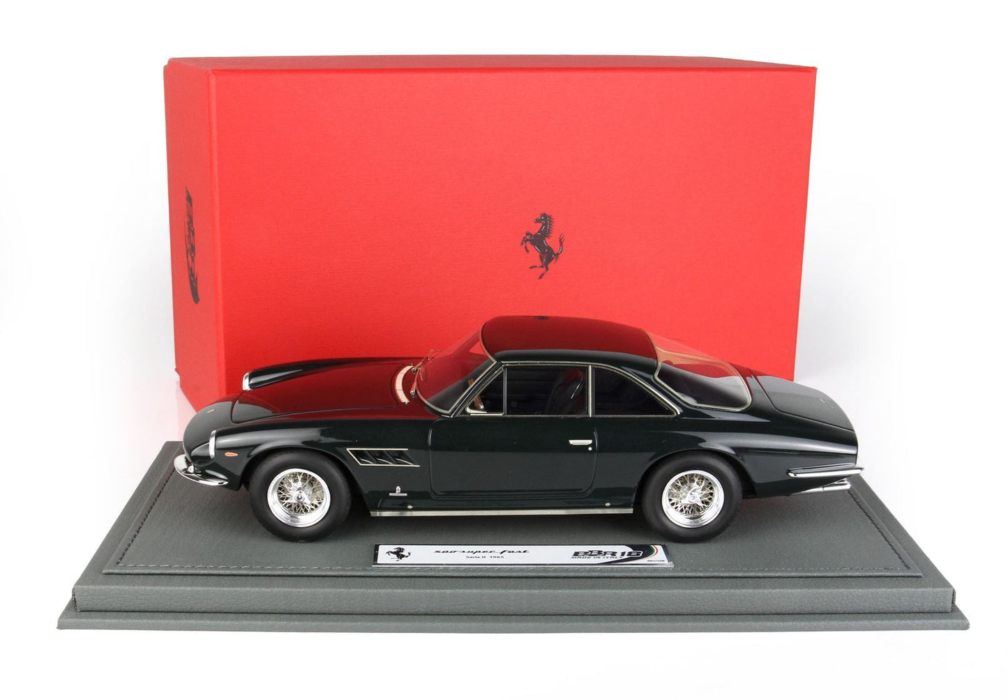 Black Ferrari 400 Super Fast model car on display stand with red Ferrari box, available on Vroomi