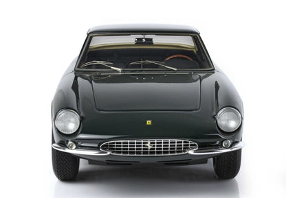 Classic dark green Ferrari GT car front view with chrome grille, available on Vroomi platform