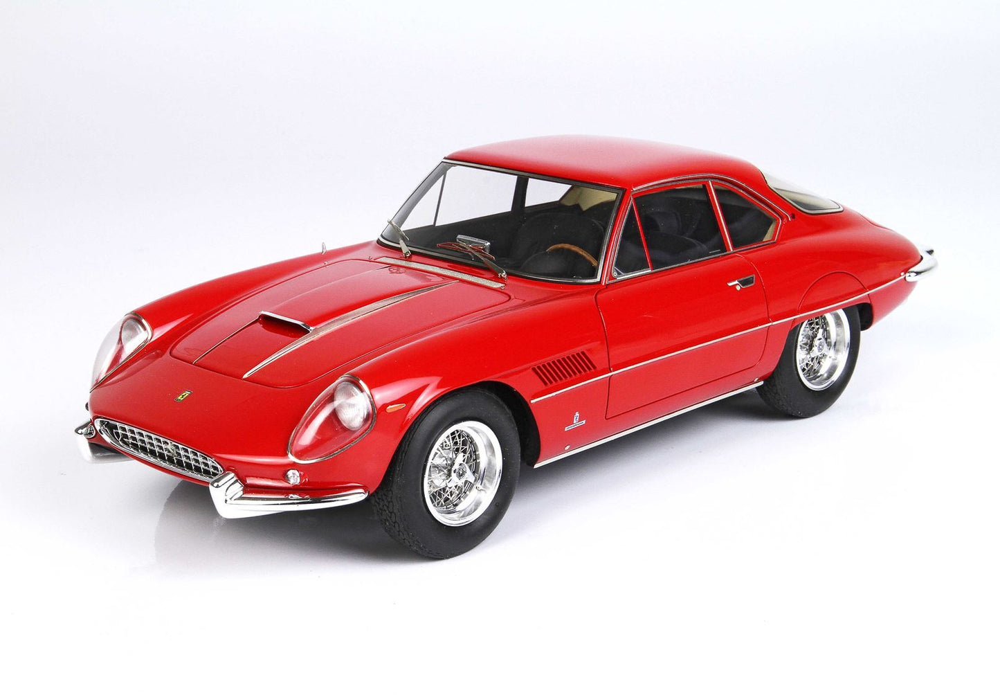 Red classic Ferrari sports car model with chrome details and wire wheels available on Vroomi