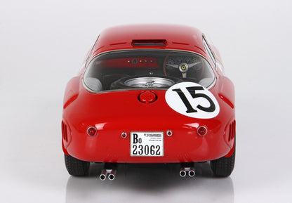 Red vintage race car rear view with number 15, dual exhausts, and spare tire, offered on Vroomi replica site