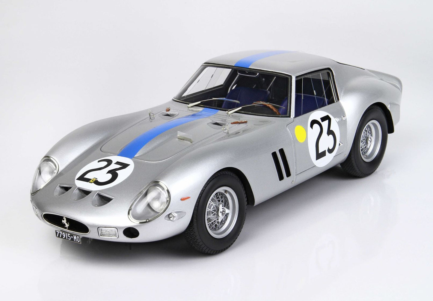 Silver vintage race car with blue stripe and number 23, classic Ferrari style, available on Vroomi