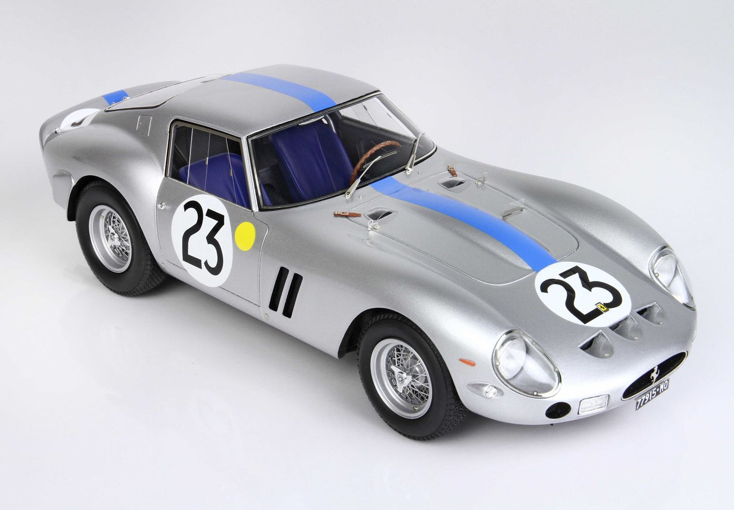 Silver classic race car with number 23 and blue stripe, detailed model available on Vroomi