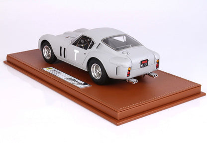 Gray Ferrari 250 GTO model car with T decal on door displayed on brown leather base, available on Vroomi