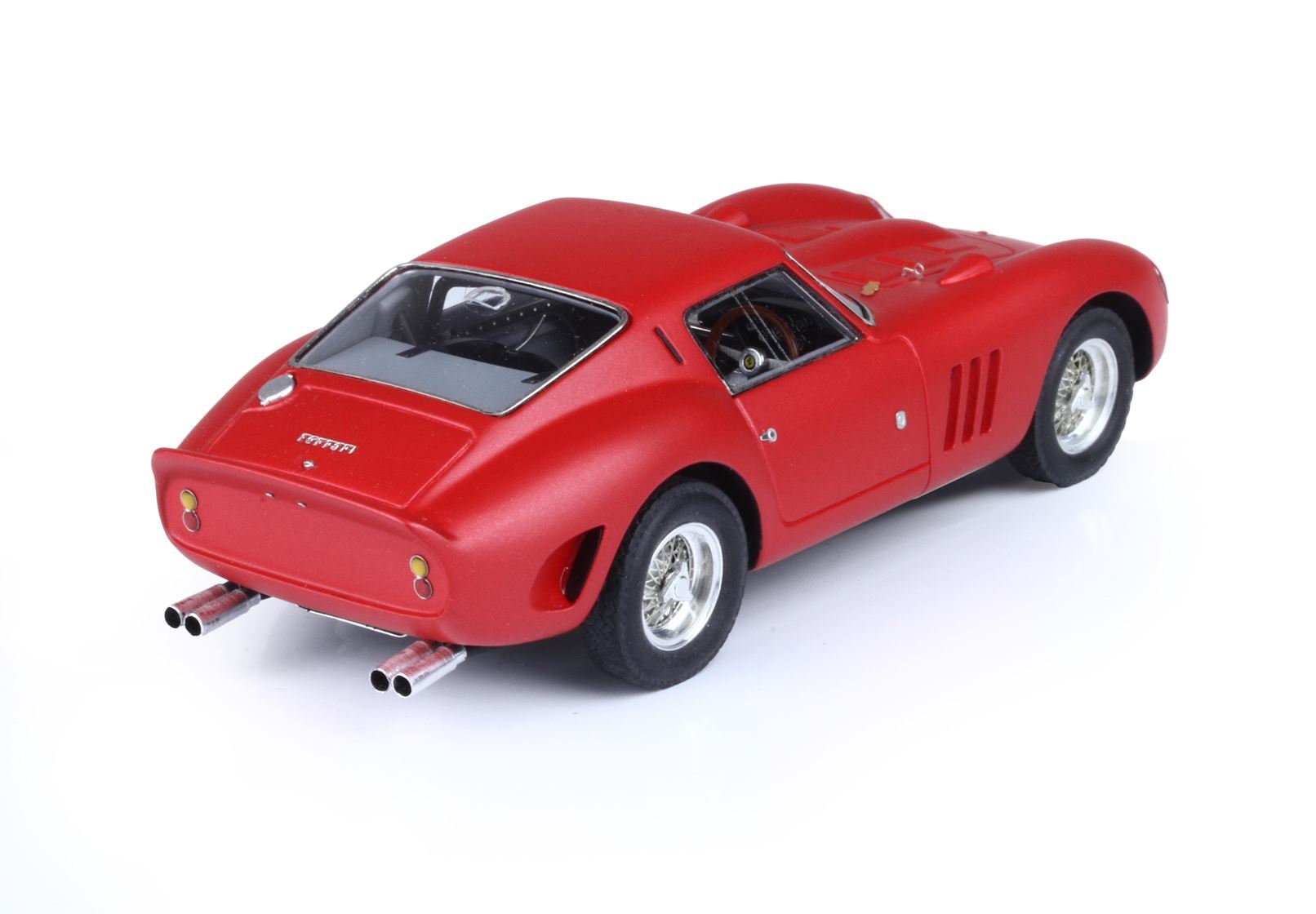 Red Ferrari classic sports car model with dual exhausts, wire wheels, and rear window, offered via Vroomi