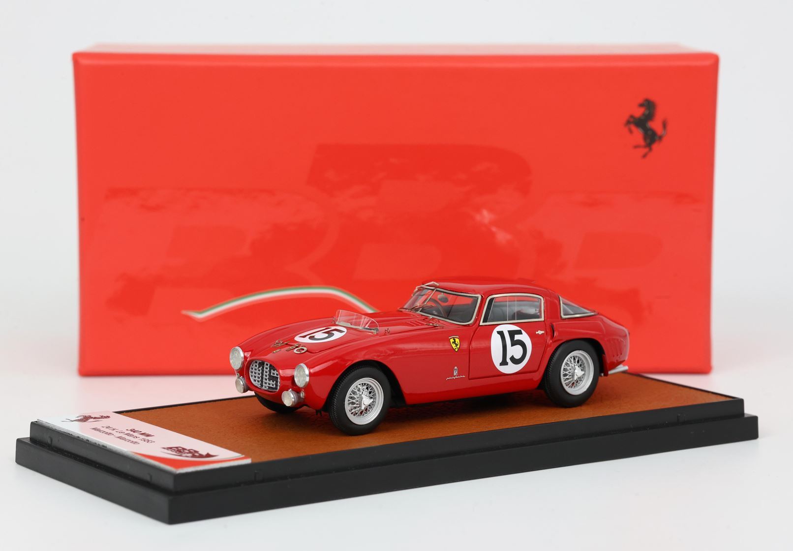 Red Ferrari 166 MM 1953 racing car model with number 15 on stand, offered via Vroomi