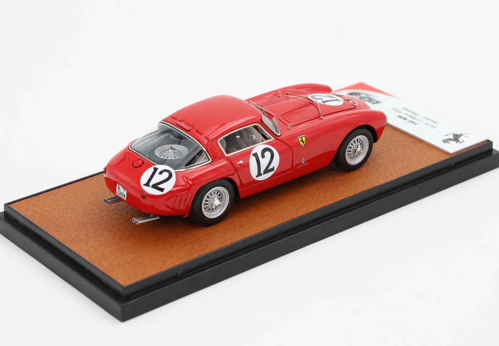 Red Ferrari 250 GT SWB model car with number 12 on display base, now offered on Vroomi